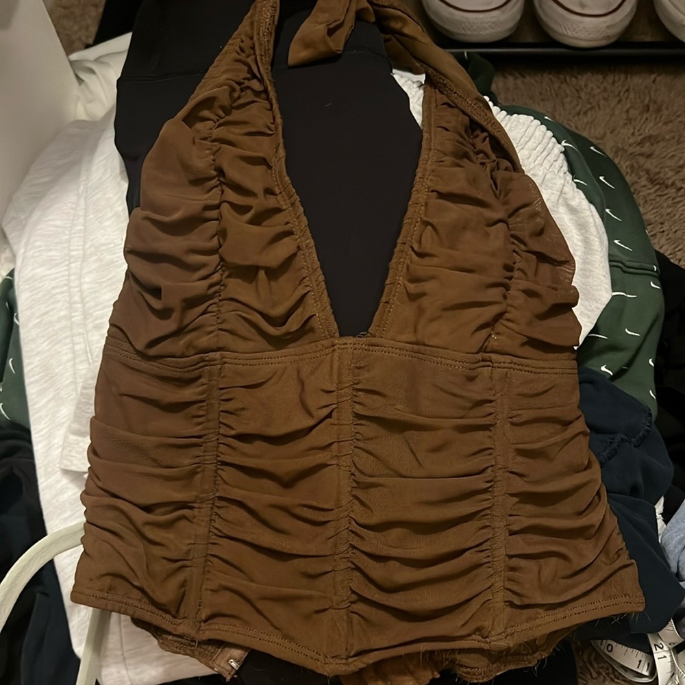 Brown corset top in size medium no damages